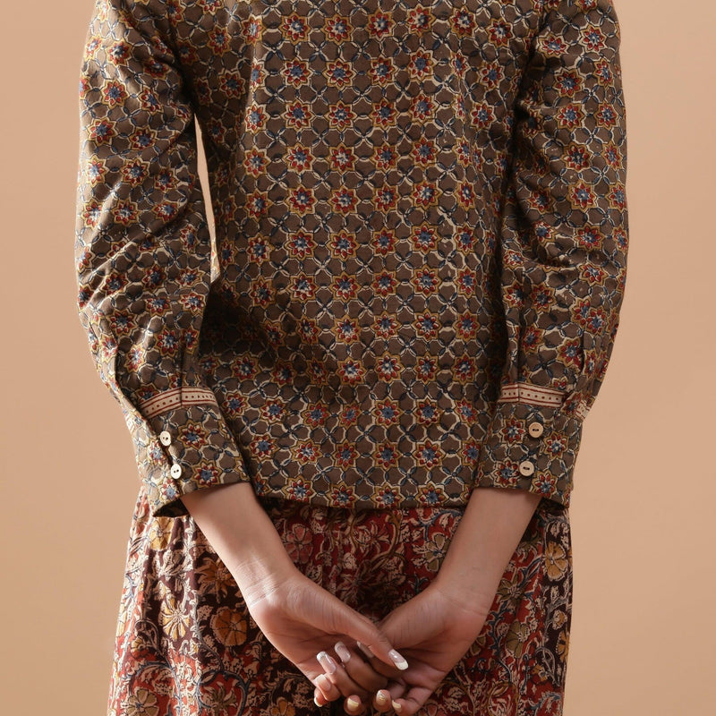 Back Detail of a Model wearing Muddy Green Kalamkari Warm Shirt