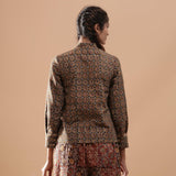 Back View of a Model wearing Muddy Green Kalamkari Warm Shirt