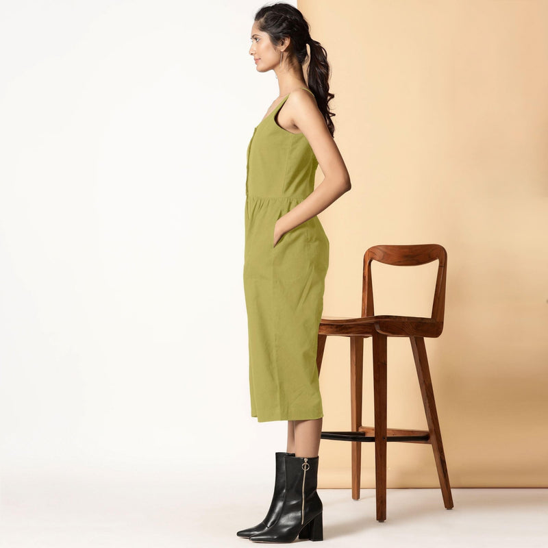 Left View of a Model wearing Green Cotton Flax Button-Down Midi Jumpsuit