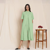 Front View of a Model wearing Cotton Green Box Pleated Jumpsuit