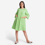 Front View of a Model wearing Green Yarn Dyed Cotton Yoked Dress