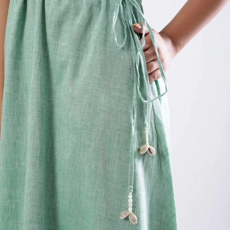 Close View of a Model wearing Green Handspun Strappy Circular Dress