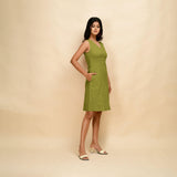 Right View of a Model wearing Green Cotton Slim Fit Short Dress