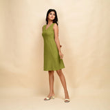 Left View of a Model wearing Green Cotton Slim Fit Short Dress