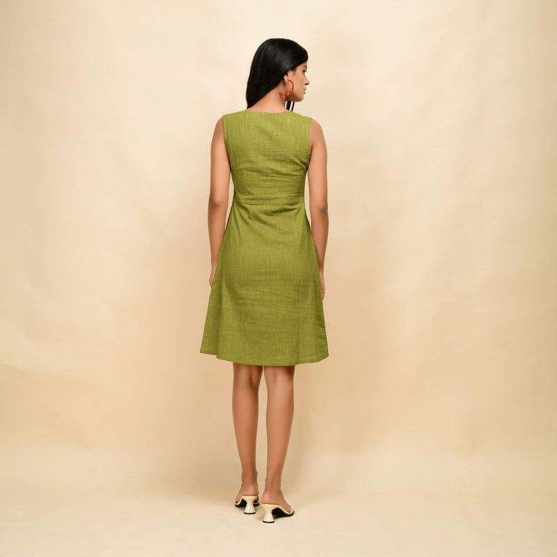 Back View of a Model wearing Green Cotton Slim Fit Short Dress