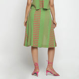 Back View of a Model wearing Green Crinkled Cotton Geometric Knee Length Skirt