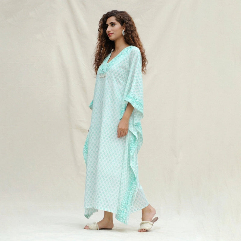 Right View of a Model wearing Green Floral Block Printed Cotton Maxi Kaftan Dress