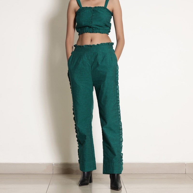 Front Detail of a Model wearing Warm Green Frilled Bustier Top and Pant Set