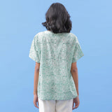 Back View of a Model wearing Green Hand Block Printed A-Line Cotton Top