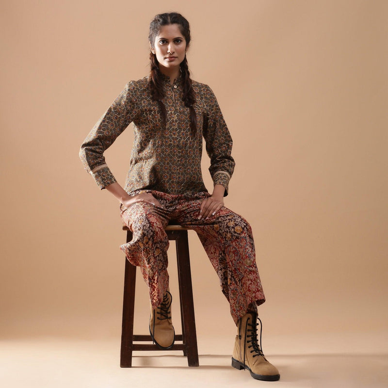 Front View of a Model wearing Muddy Green Kalamkari Warm Shirt