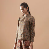 Left View of a Model wearing Green Kalamkari Block Print Warm Cotton Shirt