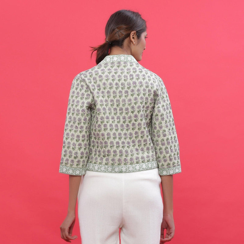 Back View of a Model wearing Green Reversible Quilted Cotton Shrug