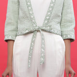 Front Detail of a Model wearing Green Reversible Quilted Cotton Shrug