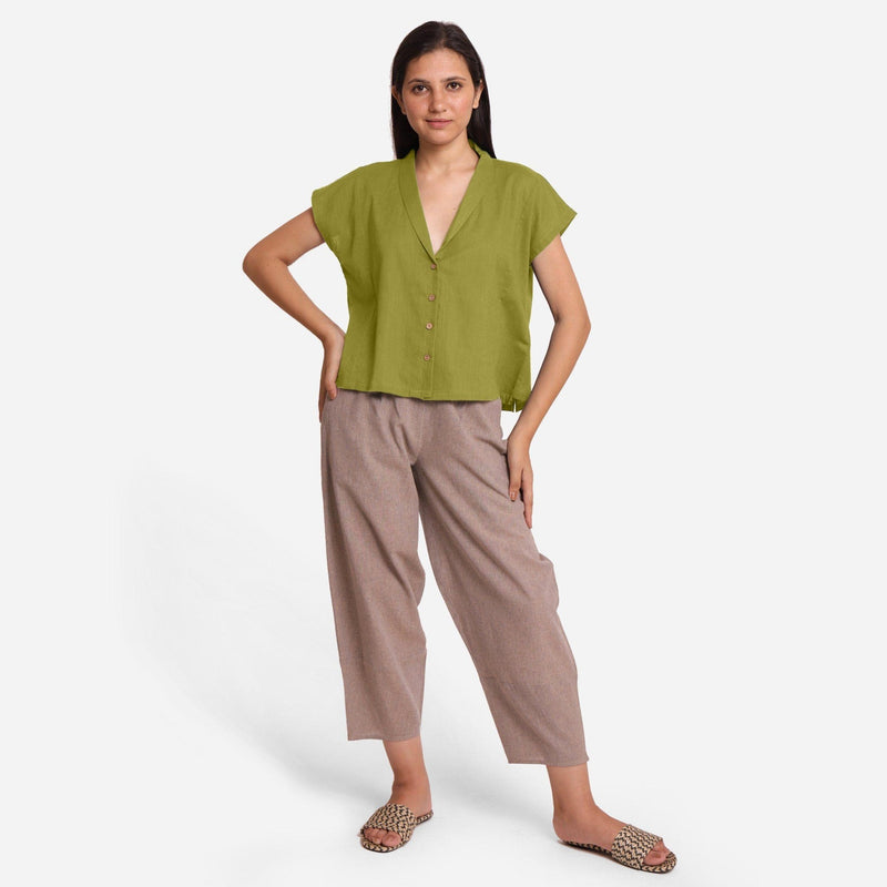 Front View of a Model wearing Green Deep Neck Button-Down Cotton Top