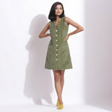 Front View of a Model wearing Cotton Corduroy Green Button-Down Dress