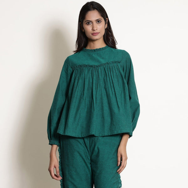 Front View of a Model wearing Warm Green Frilled Gathered Yoked Top