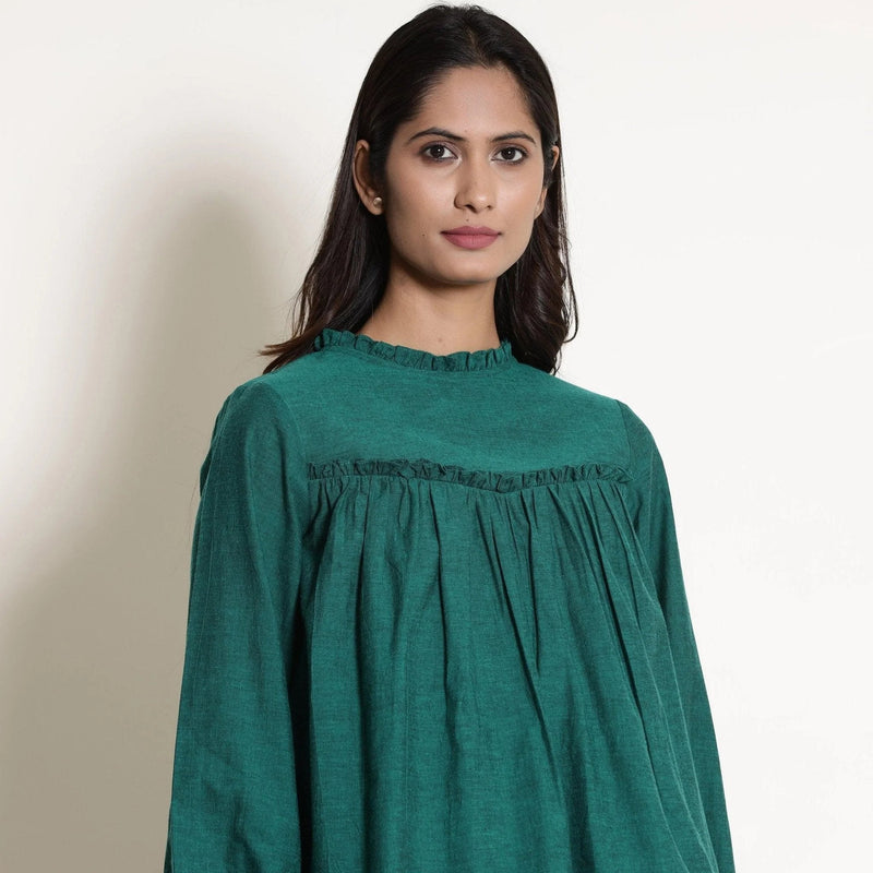 Front Detail of a Model wearing Green Warm Cotton Frilled Gathered Yoke Top