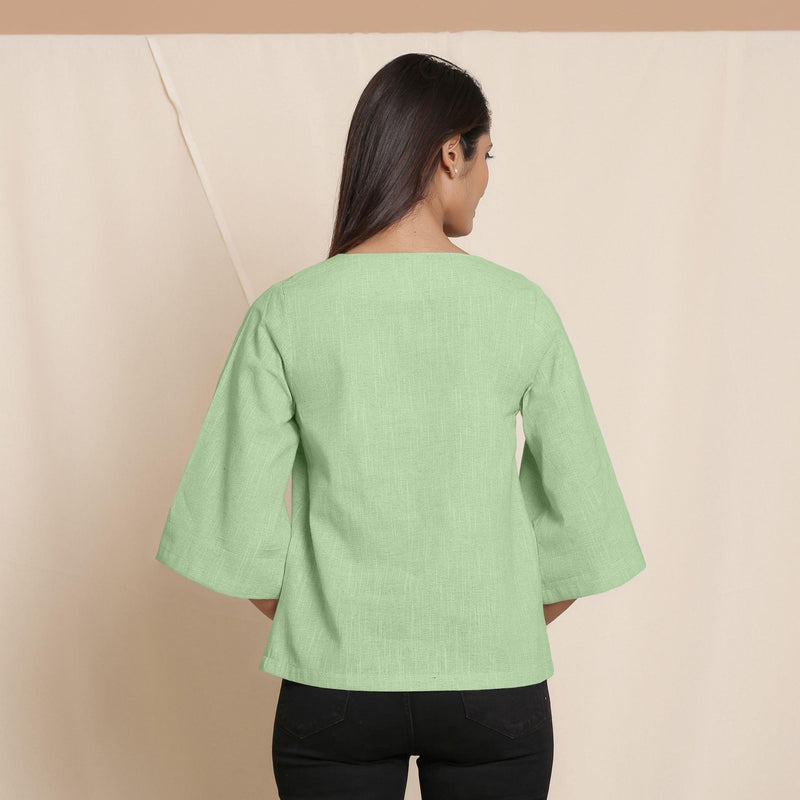 Back View of a Model wearing Green Comfy Straight Top