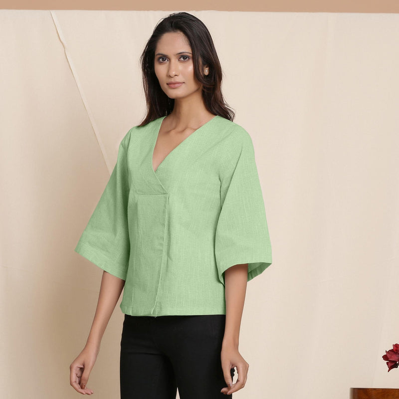 Left View of a Model wearing Green Comfy Straight Top