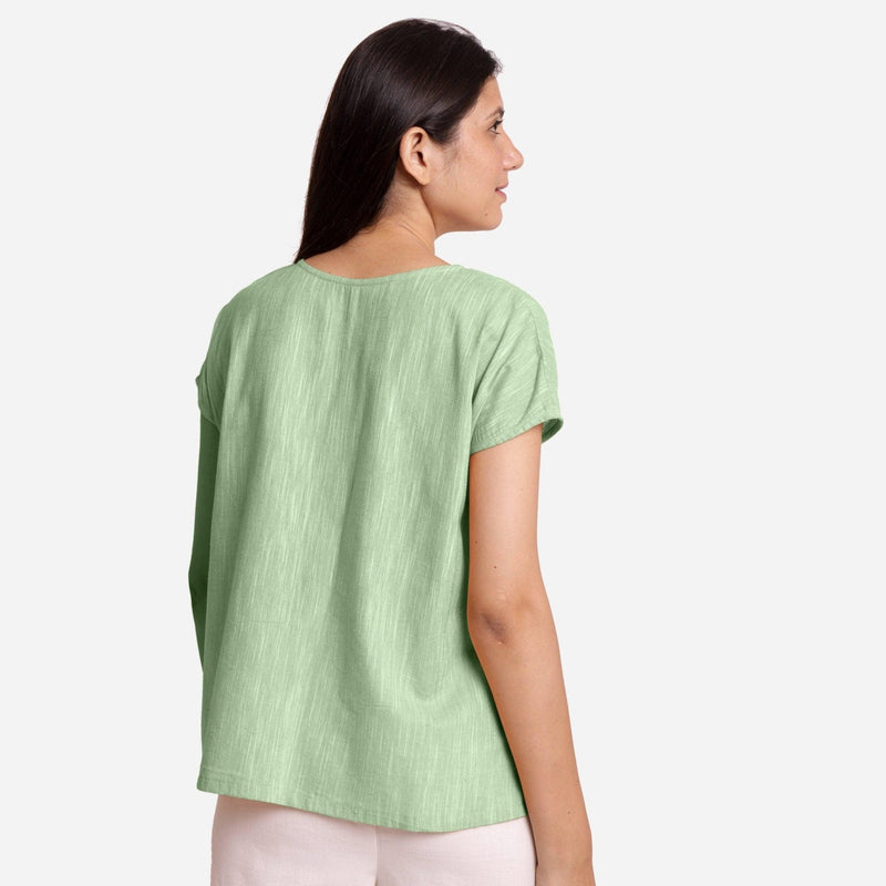 Back View of a Model wearing Green 100% Cotton Boat Neck A-Line Top