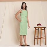 Right View of a Model wearing Green Knee Length Cotton Sheath Dress