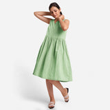 Front View of a Model wearing Yarn Dyed Cotton Green Yoke Dress