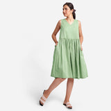 Front View of a Model wearing Yarn Dyed Cotton Green Yoke Dress