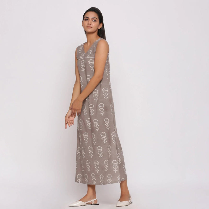 Left View of a Model wearing Grey Dabu Block Printed Cotton Shift Maxi Dress