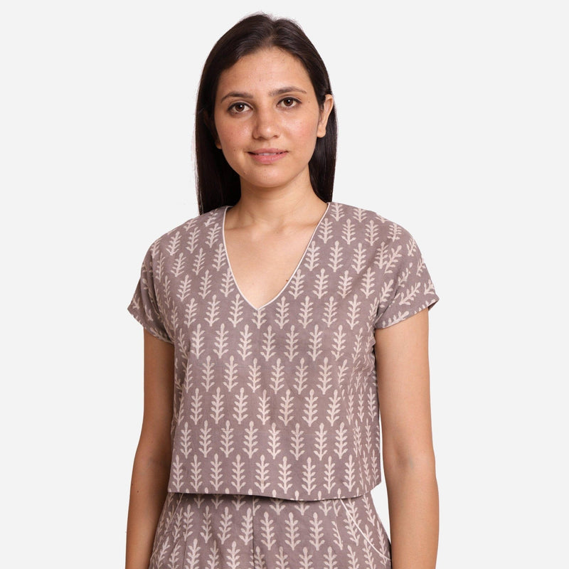 Front View of a Model wearing Grey Dabu Block Print V-Neck Crop Top