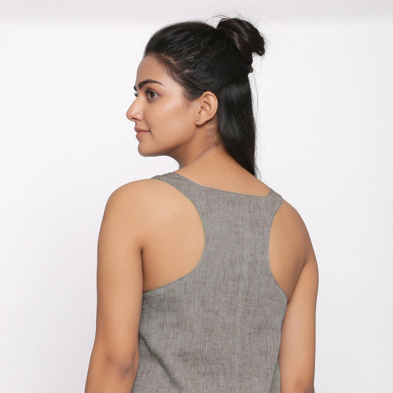 Back Detail of a Model wearing Handspun Cotton Grey Racer Back Shift Dress