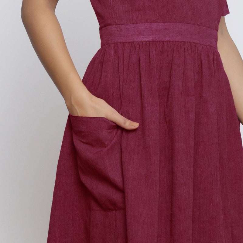 Front Detail of a Model wearing Handspun Maroon Backless Fit and Flare Dress