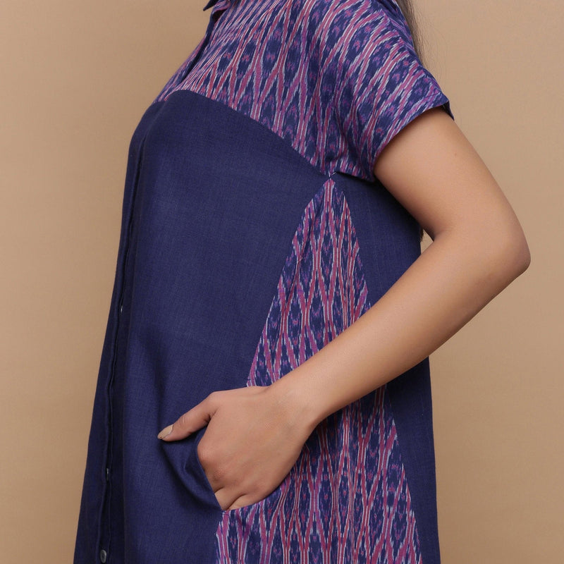 Left View of a Model wearing Ikat Handspun Button-Down Shirt Dress