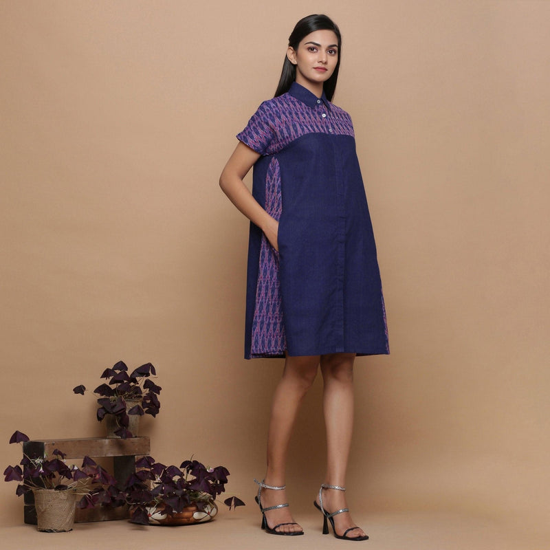 Right View of a Model wearing Ikat Handspun Button-Down Shirt Dress