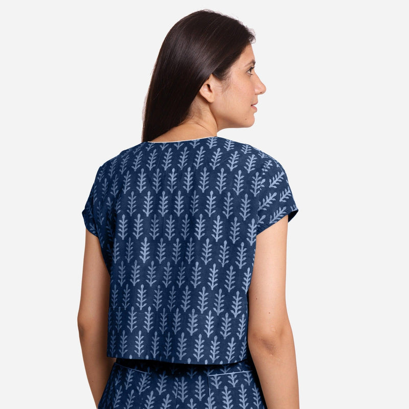 Back View of a Model wearing Indigo Dabu Block Print V-Neck Crop Top