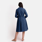 Back View of a Model wearing Indigo Botanical Pattern Button-Down Dress