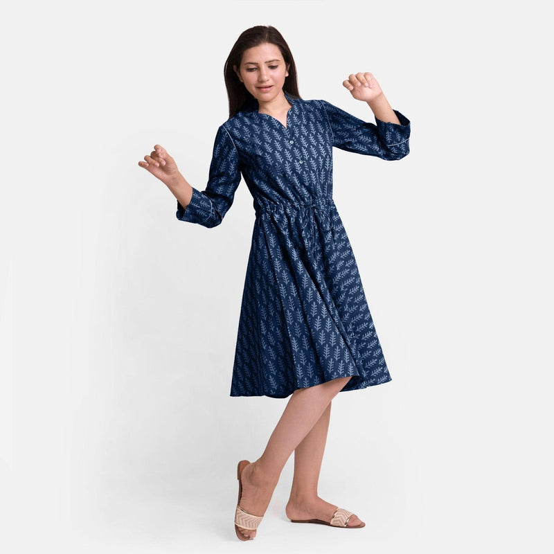 Front View of a Model wearing Indigo Botanical Pattern Button-Down Dress