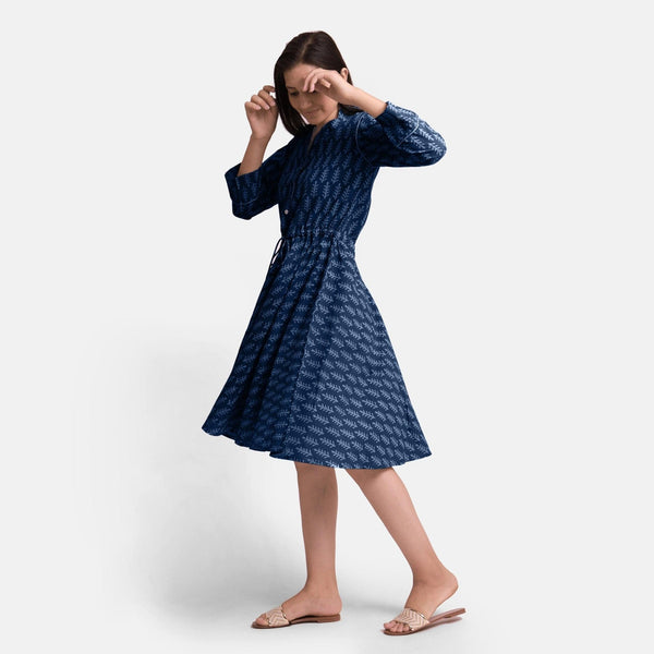 Left View of a Model wearing Indigo Botanical Pattern Button-Down Dress