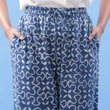 Front Detail of a Model wearing Indigo Dabu Hand Block Printed Pegged Pant