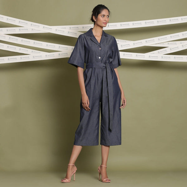 Front View of a Model wearing Cotton Denim Loose Fit Flared Jumpsuit