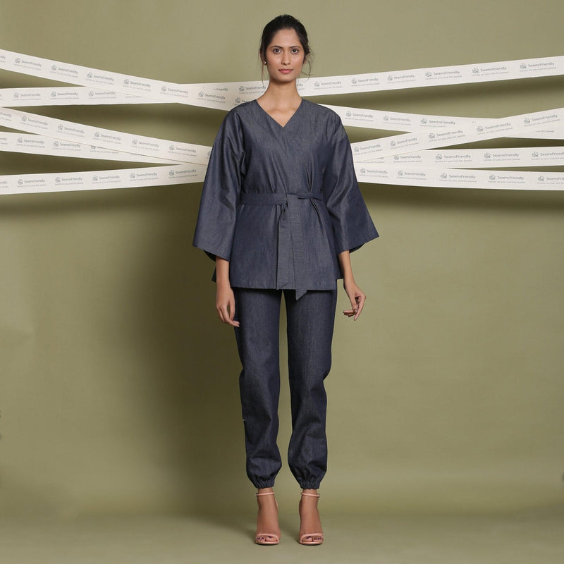 Front View of a Model wearing Indigo Cotton Denim Drop Shoulder Sleeve Overlay