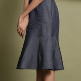 Left Detail View of a Model wearing Indigo Cotton Denim Paneled A-Line Skirt