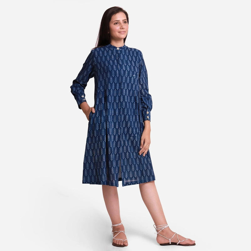 Right View of a Model wearing Indigo Dabu Block Print Button-Down Dress