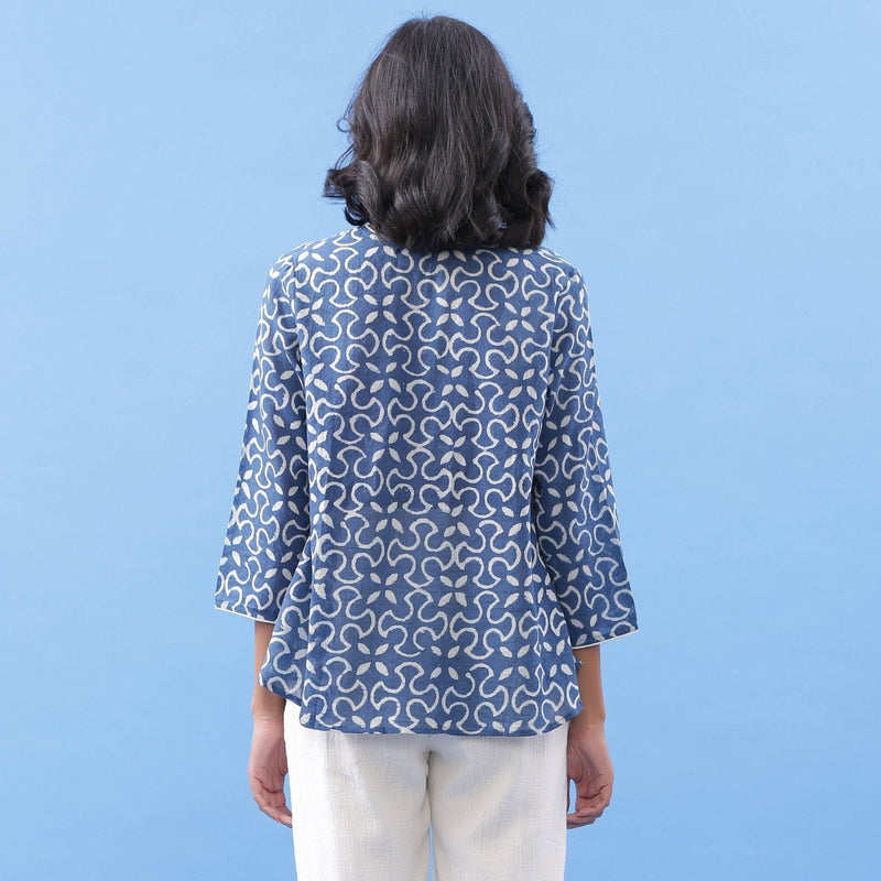 Back View of a Model wearing Indigo Dabu Hand Block Printed Flared Top