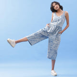 Front View of a Model wearing Indigo Dabu Printed Button-Down Jumpsuit