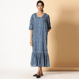 Front View of a Model wearing Breezy Cotton Indigo Dabu Maxi Tier Dress