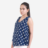 Left View of a Model wearing Indigo Dabu Block Printed Sleeveless V-Neck Top