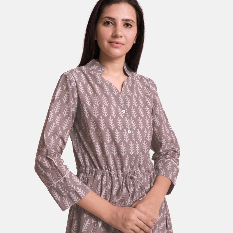 Front Detail of a Model wearing Kashish Botanical Pattern Button-Down Dress