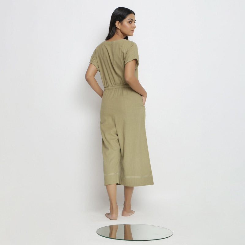 Back View of a Model wearing Vegetable Dyed Button-Down Jumpsuit