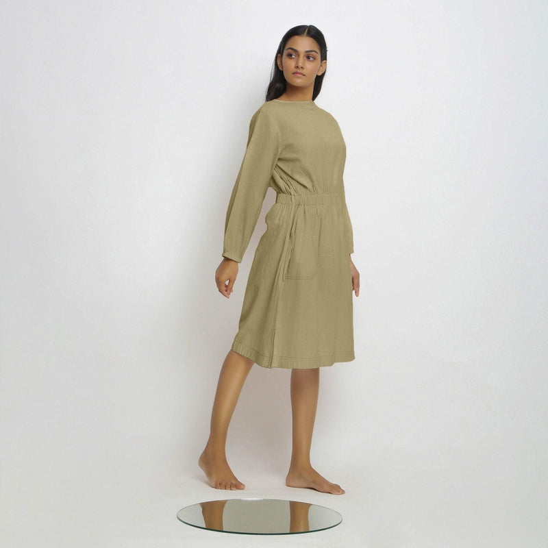 Right View of a Model wearing Vegetable-Dyed Green 100% Cotton Dress