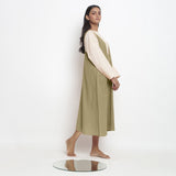 Right View of a Model wearing Khadi Green Handspun Cotton Deep Neck Shift Dress